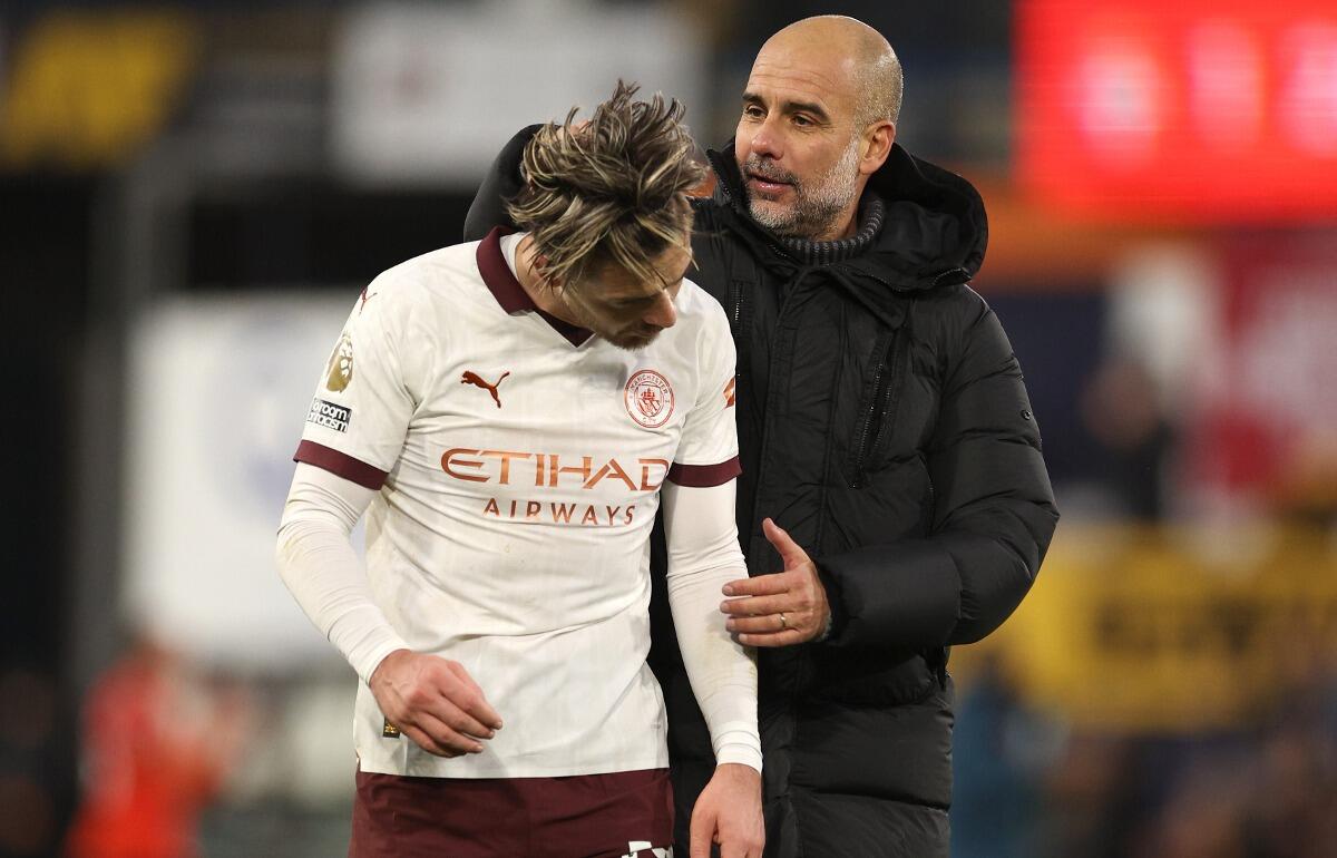 マンチェスター・シティのジョゼップ・グアルディオラ監督とジャック・グリーリッシュ