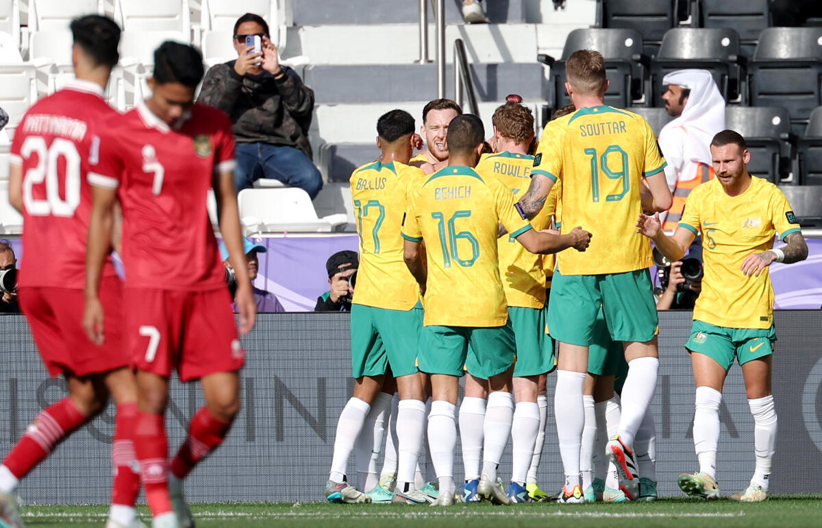 先制点を挙げて喜ぶオーストラリアの選手たち